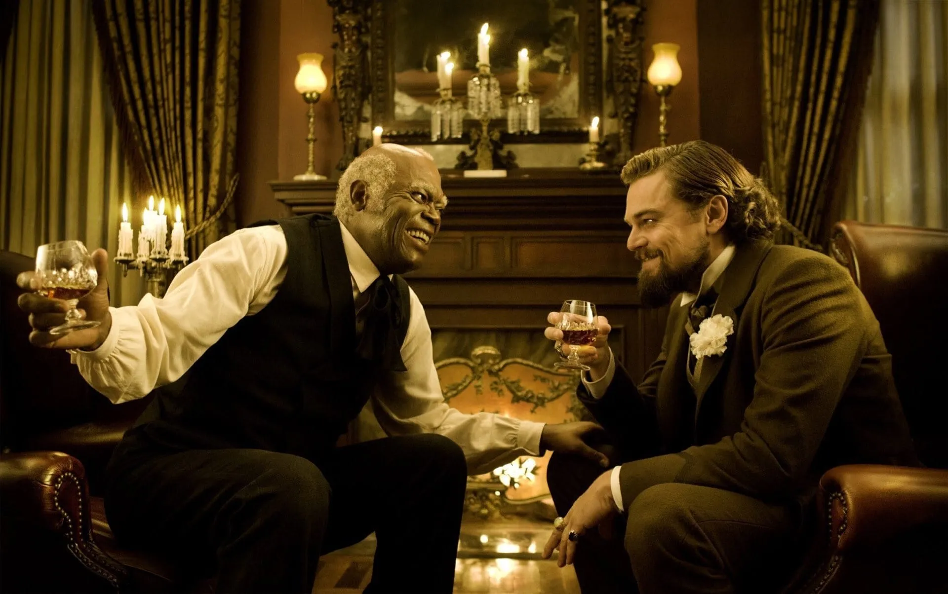 Stephen and Calvin Candie sharing drinks in Django Unchained, illustrating false loyalty: the offshore manager archetype who survives by pleasing those above while suppressing those below.